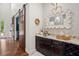 Chic bar area with custom wine rack and sliding barn door entry at 6910 Tanner Hall Blvd, Hanahan, SC 29410