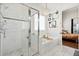 Elegant bathroom features a separate shower and tub with stylish decor at 6910 Tanner Hall Blvd, Hanahan, SC 29410