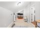 Bonus room with carpet, two TVs, bookshelf, couch, and pillows at 6910 Tanner Hall Blvd, Hanahan, SC 29410