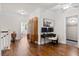 Hallway with a desk, chair and wooden cabinet for storing items at 6910 Tanner Hall Blvd, Hanahan, SC 29410