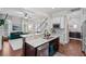 Modern kitchen features granite counters, stainless steel appliances and island seating at 6910 Tanner Hall Blvd, Hanahan, SC 29410