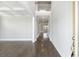 Bright entryway boasts hardwood flooring and an open floor plan, creating an inviting ambiance at 708 Breakers Reef Ln, Huger, SC 29450