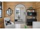 Charming living room with wood-paneled walls, stylish decor, and an inviting atmosphere, perfect for relaxation at 71 Moultrie St, Charleston, SC 29403
