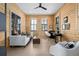 Bright living room featuring wooden paneling, modern furnishings, and an open layout perfect for relaxation and entertaining at 71 Moultrie St, Charleston, SC 29403