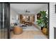 Open-concept living space features a large sliding door, hardwood floors, and modern decor with stylish furniture at 71 Moultrie St, Charleston, SC 29403