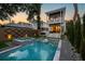 A luxurious backyard featuring a pristine pool and hot tub, perfect for relaxation and entertaining at 71 Moultrie St, Charleston, SC 29403