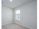 Bedroom featuring neutral walls and carpet, with a window at 740 Meadowbrook Lane, Summerville, SC 29486