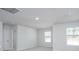 A light-filled bedroom featuring carpet and windows at 740 Meadowbrook Lane, Summerville, SC 29486