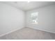 Bedroom featuring neutral walls and carpet, with a window at 740 Meadowbrook Lane, Summerville, SC 29486