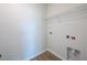 A tidy laundry room with wire shelving is ready for the washer, dryer, and supplies at 740 Meadowbrook Lane, Summerville, SC 29486