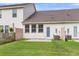Well-maintained backyard with a lush lawn, patio, and fenced perimeter for privacy at 7812 Park Gate Dr, North Charleston, SC 29418
