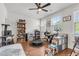Bright bedroom with hardwood floor, exercise equipment and furniture at 7812 Park Gate Dr, North Charleston, SC 29418