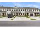 Charming townhouse complex with a black car parked in front of unit at 7812 Park Gate Dr, North Charleston, SC 29418