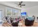 Bright living room with large windows and hardwood floors at 7812 Park Gate Dr, North Charleston, SC 29418