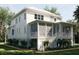 Inviting home features a screened-in porch, offering a relaxing outdoor space with scenic views at 8266 Jack Island Dr, Johns Island, SC 29455
