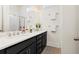 Bright bathroom features a double vanity, modern fixtures, and stylish tile flooring at 8604 Bowen Corner Ave, Hanahan, SC 29410