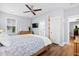 Bedroom with four-poster bed, ceiling fan, TV, and en-suite bathroom at 8604 Bowen Corner Ave, Hanahan, SC 29410