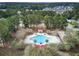 Community amenities include a pool, playground, and clubhouse, surrounded by trees and a residential neighborhood at 1005 Washitonia Way # B, Charleston, SC 29492