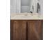 Bathroom with dark wood vanity, framed mirror, and light countertop at 1005 Washitonia Way # B, Charleston, SC 29492