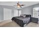 Bedroom featuring vaulted ceilings, carpet, two windows, and two closets at 1005 Washitonia Way # B, Charleston, SC 29492