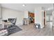 Open-concept living area featuring stylish flooring, ample natural light, and seamless transition to the adjacent kitchen at 1005 Washitonia Way # B, Charleston, SC 29492