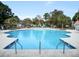 A large pool with lounge chairs and a playground, perfect for relaxation and Gathering fun at 1005 Washitonia Way # B, Charleston, SC 29492