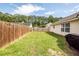 Fenced backyard providing privacy and security, featuring a lush lawn and space for outdoor activities at 102 Jasimine Ct, Summerville, SC 29486