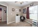 Cozy bedroom featuring neutral paint, plush carpet, and natural light from a window at 102 Jasimine Ct, Summerville, SC 29486