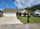 Charming single Gathering home with a two car garage and a well maintained lawn at 102 Jasimine Ct, Summerville, SC 29486