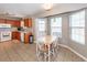 Well lit kitchen with wood cabinets, white appliances, and ceramic tile flooring at 102 Jasimine Ct, Summerville, SC 29486
