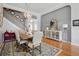 Elegant dining room featuring a stylish chandelier, and staircase, perfect for entertaining guests at 105 Corral Cir, Summerville, SC 29485