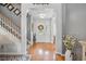 Inviting foyer with hardwood floors and arched entryway, showcasing a bright and welcoming entrance to the home at 105 Corral Cir, Summerville, SC 29485