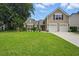 Charming two-story home with a well-manicured lawn and a two car garage at 105 Corral Cir, Summerville, SC 29485