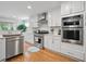 Charming kitchen with stainless steel appliances, bright lighting, and ample storage space at 105 Corral Cir, Summerville, SC 29485