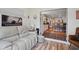 View from a sunroom to a chef-inspired kitchen with hardwood floors at 105 Corral Cir, Summerville, SC 29485