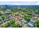 Aerial view showing residential neighborhoods, lush trees, a bridge and some taller buildings at 11 Francis St, Charleston, SC 29403
