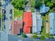 Aerial view of property showcasing its location, backyard patio and proximity to nearby homes and foliage at 11 Francis St, Charleston, SC 29403