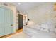 Bedroom with bright wallpaper, a sofa, and an open door that lets in plenty of light at 11 Francis St, Charleston, SC 29403