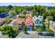 Charming side-by-side homes with unique architecture, quaint balconies, and tree-lined street at 11 Francis St, Charleston, SC 29403