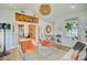 Bright and open living room with modern furnishings, art, and access to other living spaces at 11 Francis St, Charleston, SC 29403