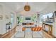 Cozy living room featuring stylish seating, a decorative pendant light, and plenty of light at 11 Francis St, Charleston, SC 29403