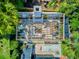 Aerial view of outdoor patio featuring seating, planters, and stylish pergola, perfect for entertaining at 11 Francis St, Charleston, SC 29403