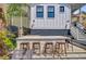 Charming outdoor bar area with seating, attached to the home and perfect for entertaining guests or casual dining at 11 Francis St, Charleston, SC 29403