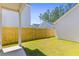 Well-maintained backyard with a wooden fence and lush green grass at 112 Crimson St, Summerville, SC 29486