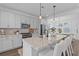Modern kitchen with granite countertops, stainless steel appliances, and a center island with seating at 112 Crimson St, Summerville, SC 29486