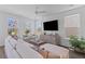 Cozy living room with natural light, neutral decor, and comfortable seating creates an inviting atmosphere at 112 Crimson St, Summerville, SC 29486