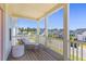 Relaxing porch with a chaise lounge and scenic views of the neighborhood at 112 Crimson St, Summerville, SC 29486