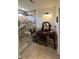 Bright bathroom features a tiled shower with bench seating, and a vanity with decorative mirror at 114 Sea Cotton Cir, Charleston, SC 29412