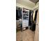 Well-organized walk-in closet with built-in shelving and ample storage space at 114 Sea Cotton Cir, Charleston, SC 29412