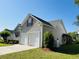 Charming home with a two-car garage, neutral siding, and well-maintained landscaping at 114 Sea Cotton Cir, Charleston, SC 29412
